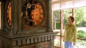Maddy admires the clock in Antonia and Norman's living room