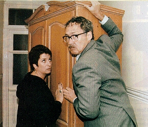 Publicity shot from The Reconstituted Corpse, Maddy with Sheldon moving a wardrobe